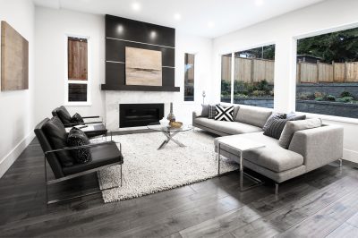 I so enjoy the simplicity of this retro room.  The bold slabs of dark wood grain combined with the near white marble fireplace facia is so cool.  Drop in a couple 60's sets of furniture, a cool painting or two and you’re done!